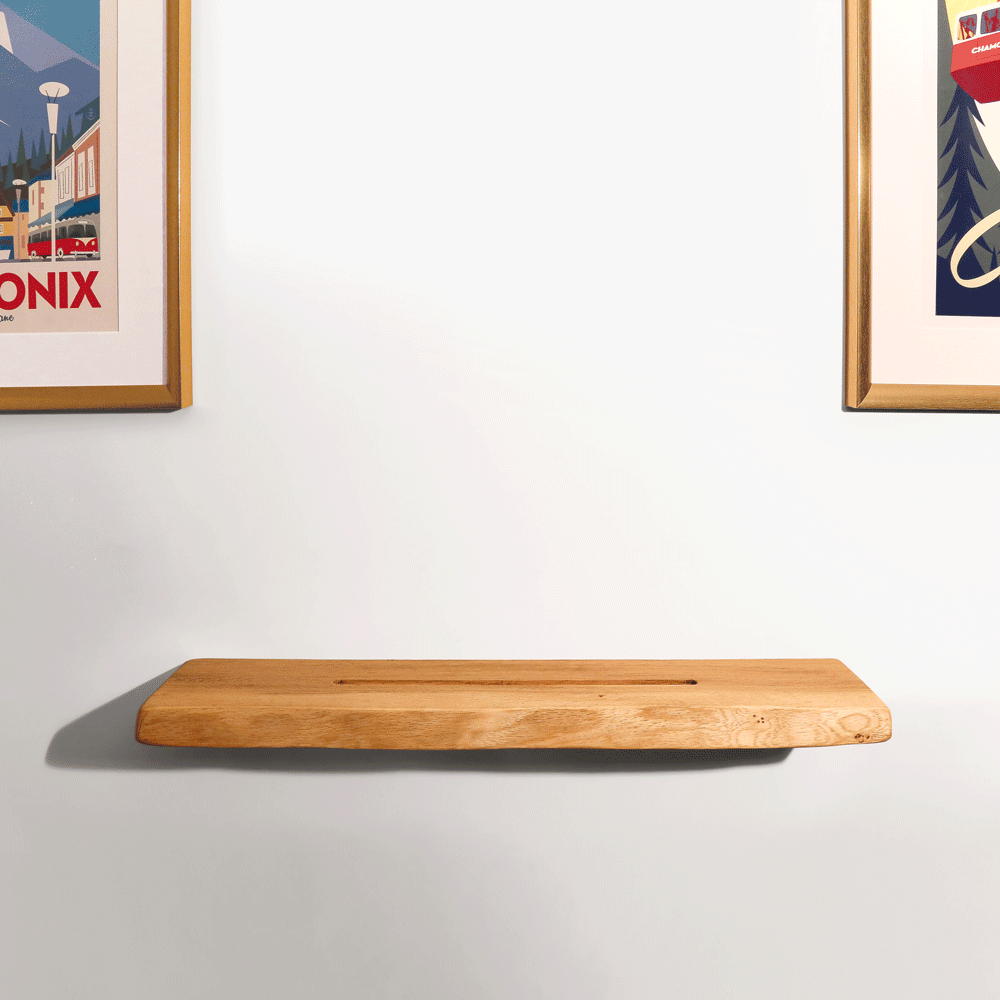 Video showcasing a live edge now playing shelf by different vinyl sleeves flicking from one to another. All sat neatly in the cut out slot.