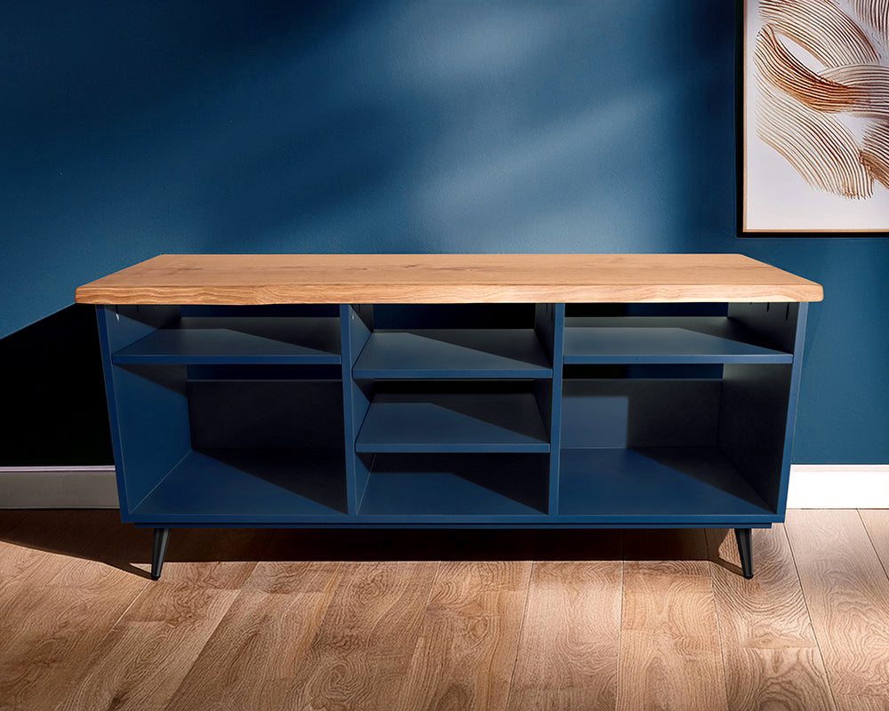 Modern dark blue media unit with solid oak live edge top. Features two large vinyl record storage sections with adjustable shelves for media devices, and three central shelves for CDs, gaming consoles, or accessories. Stylish mid-century design with sturdy black legs, perfect for contemporary living rooms.