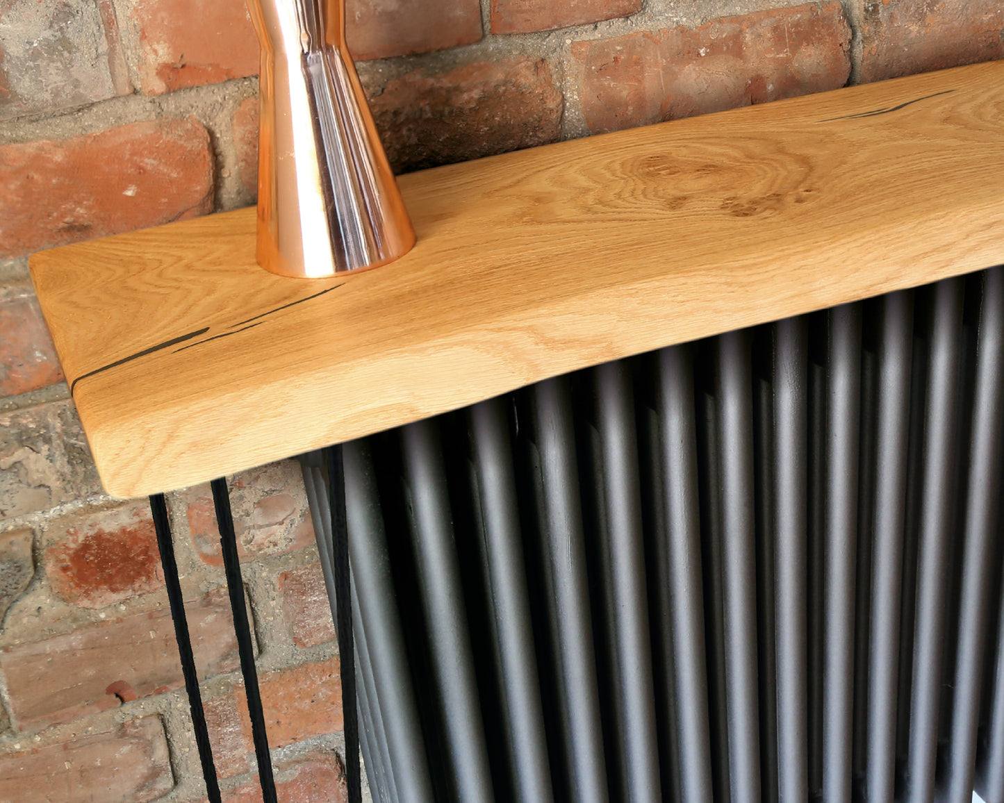 Handcrafted solid oak console table with live edge, black resin filler, and custom sizes. Stylish, bespoke furniture for any room.